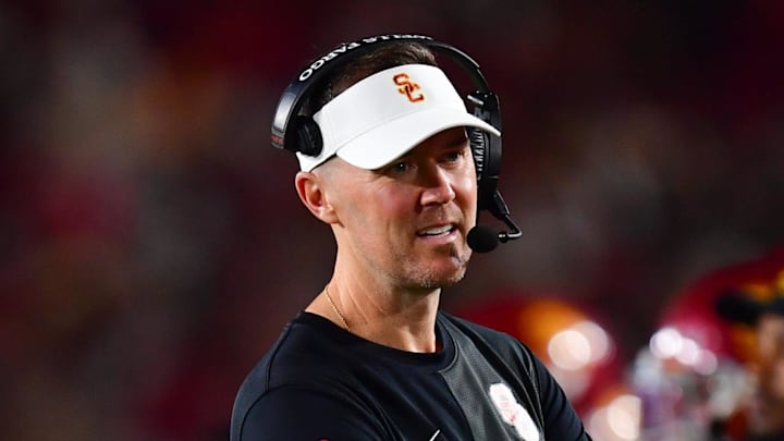 Sep 20, 2025; Los Angeles, California, USA; Southern California Trojans head coach Lincoln Riley speaks with the official during the second half at the Los Angeles Memorial Coliseum. Mandatory Credit: Gary A. Vasquez-Imagn Images
