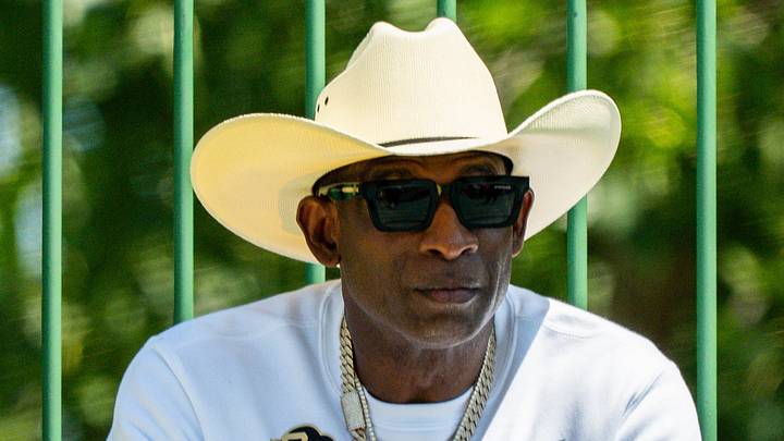 Deion Sanders takes in the second day of Cleveland Browns training camp, July 30, 2026, in Berea, Ohio.