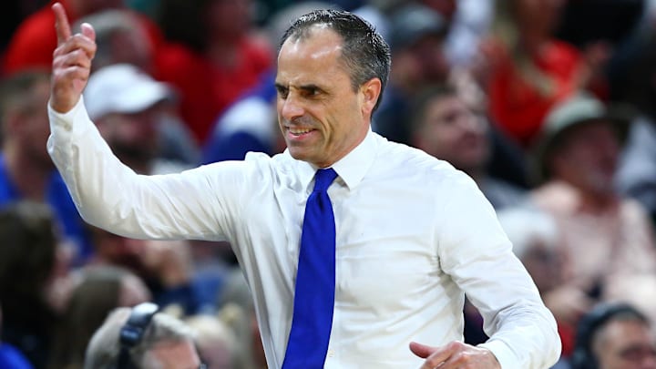 Mar 22, 2025; Wichita, KS, USA; Drake Bulldogs head coach Ben McCollum reacts after a play against the Texas Tech Red Raiders during the first half at Intrust Bank Arena. Mandatory Credit: Nick Tre. Smith-Imagn Images