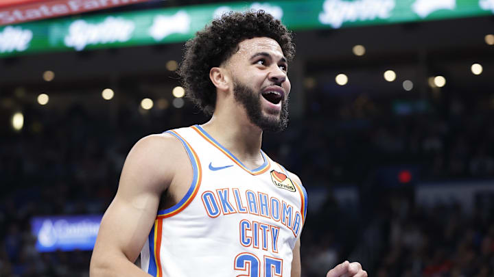 Oct 30, 2024; Oklahoma City, Oklahoma, USA; Oklahoma City Thunder guard Ajay Mitchell (25) reacts after a play against the San Antonio Spurs during the second quarter at Paycom Center. Mandatory Credit: Alonzo Adams-Imagn Images Oct 30, 2024; Oklahoma City, Oklahoma, USA; Oklahoma City Thunder guard Ajay Mitchell (25) reacts after a play against the San Antonio Spurs during the second quarter at Paycom Center. Mandatory Credit: Alonzo Adams-Imagn Images