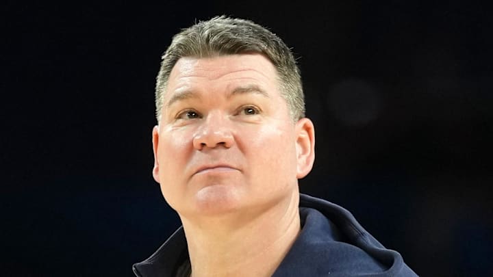 Apr 3, 2026; Indianapolis, IN, USA; Arizona Wildcats head coach Tommy Lloyd looks on during a practice session ahead of the Final Four of the men's 2026 NCAA Tournament at Lucas Oil Stadium. Mandatory Credit: Robert Deutsch-Imagn Images