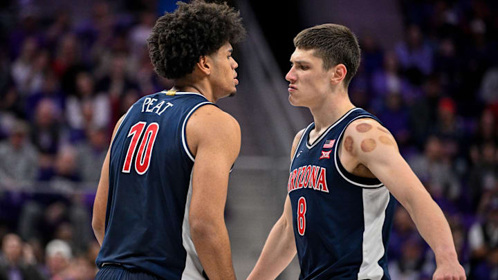 Jan 10, 2026; Fort Worth, Texas, USA; Arizona Wildcats forward Koa Peat (10) and forward Ivan Kharchenkov (8) celebrate during the game between the Horned Frogs and the Wildcats at Ed and Rae Schollmaier Arena. Mandatory Credit: Jerome Miron-Imagn Images