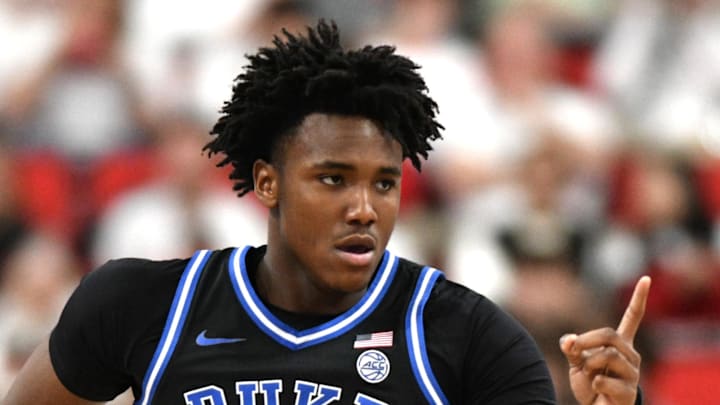 Mar 2, 2026; Raleigh, North Carolina, USA;  Duke Blue Devils center Patrick Ngongba II (21) reacts after scoring against the NC State Wolfpack during the first half at Lenovo Center. Mandatory Credit: Zachary Taft-Imagn Images