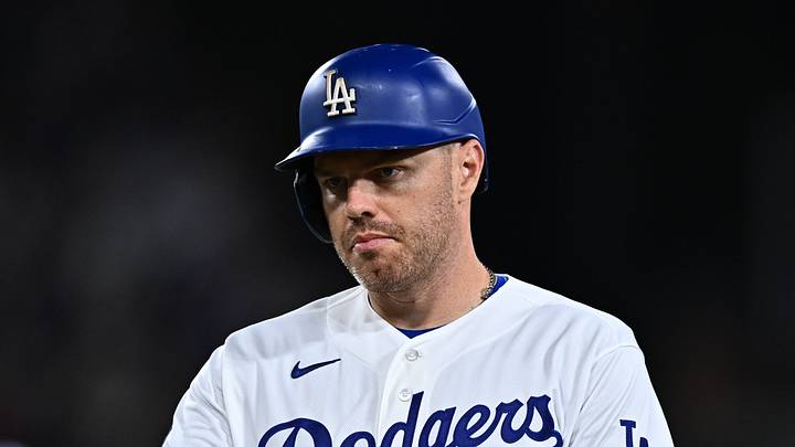 Sep 22, 2026; Los Angeles, California, USA;  Los Angeles Dodgers first baseman Freddie Freeman (5) reacts after RBI single during the second inning against the San Diego Padres at Dodger Stadium.  Mandatory Credit: William Liang-Imagn Images