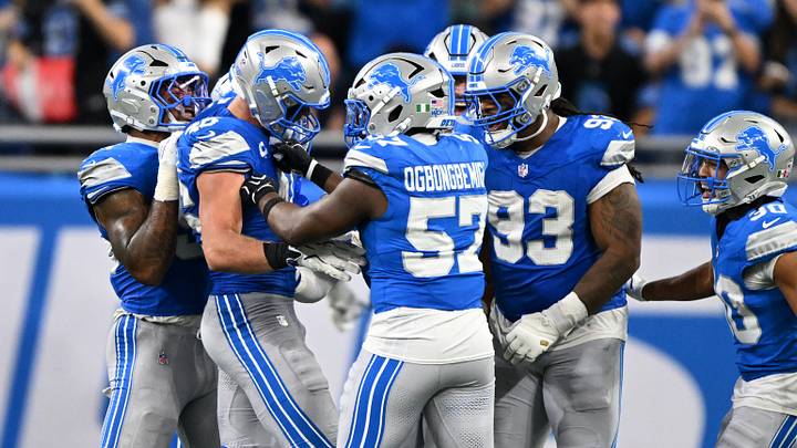 The Detroit Lions celebrate the win. The Detroit Lions celebrate the win.