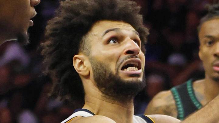 Apr 23, 2026; Minneapolis, Minnesota, USA; Denver Nuggets guard Jamal Murray (27) goes to the basket past Minnesota Timberwolves forward Jaden McDaniels (3) in the fourth quarter at Target Center. Mandatory Credit: Bruce Kluckhohn-Imagn Images