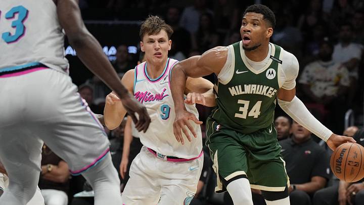 Apr 5, 2025; Miami, Florida, USA; Milwaukee Bucks forward Giannis Antetokounmpo (34) looks to pass the ball as Miami Heat guard Pelle Larsson (9) defends during the second half at Kaseya Center. Mandatory Credit: Jim Rassol-Imagn Images Apr 5, 2025; Miami, Florida, USA; Milwaukee Bucks forward Giannis Antetokounmpo (34) looks to pass the ball as Miami Heat guard Pelle Larsson (9) defends during the second half at Kaseya Center. Mandatory Credit: Jim Rassol-Imagn Images
