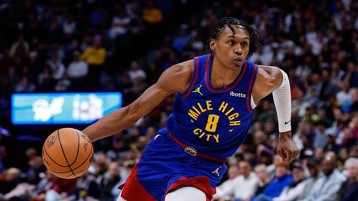 Feb 1, 2026; Denver, Colorado, USA; Denver Nuggets guard Peyton Watson (8) controls the ball in the third quarter against the Oklahoma City Thunder at Ball Arena. Mandatory Credit: Isaiah J. Downing-Imagn Images