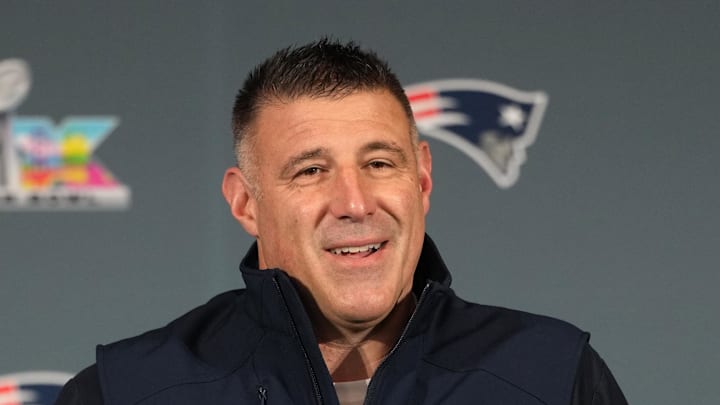New England Patriots head coach Mike Vrabel talks to media members