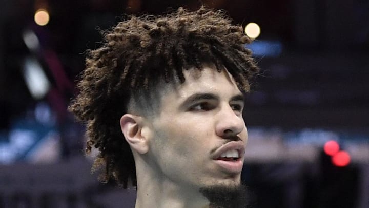 Charlotte Hornets guard LaMelo Ball looks around after being called for a foul against the Orlando Magic.