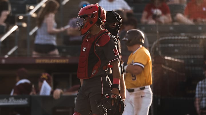 Nebraska catcher Jeter Worthley waits for the next batter from Minnesota.