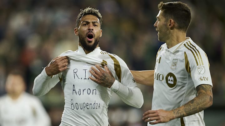 LAFC forward Denis Bouanga, left, honored his former Gabonese national teammate Aaron Boupendza, who died earlier in the week