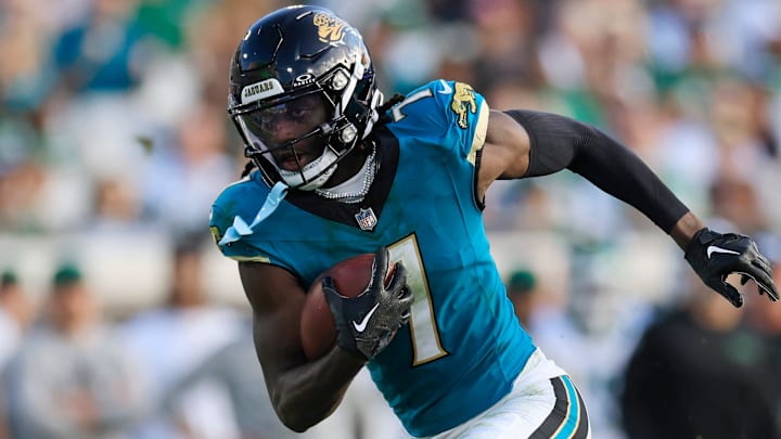 Jacksonville Jaguars wide receiver Brian Thomas Jr. (7) rushes for yards during the fourth quarter Sunday, Dec. 15, 2024 at EverBank Stadium in Jacksonville, Fla. The Jets held off the Jaguars 32-25. [Corey Perrine/Florida Times-Union]