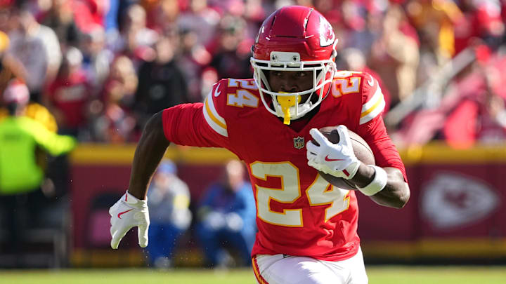 Nov 23, 2025; Kansas City, Missouri, USA;  Kansas City Chiefs running back Brashard Smith (24) runs against the Indianapolis Colts in the first half at GEHA Field at Arrowhead Stadium.
