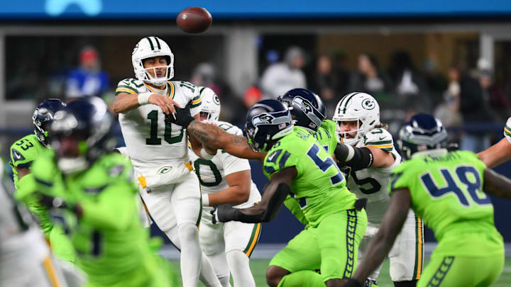 Dec 15, 2024; Seattle, Washington, USA; Green Bay Packers quarterback Jordan Love (10) passes the ball against the Seattle Seahawks during the second half at Lumen Field.