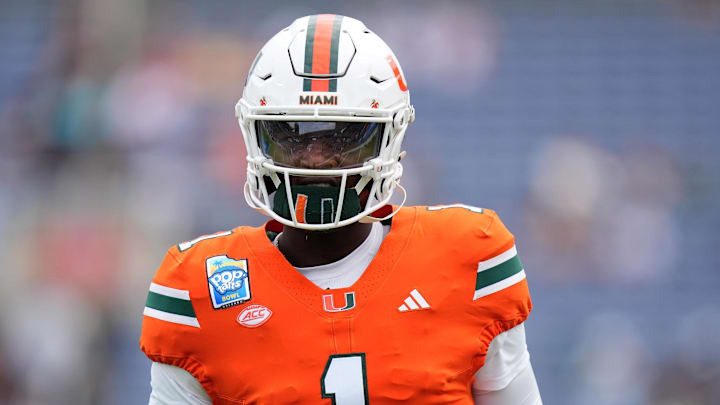 Dec 28, 2024; Orlando, FL, USA; Miami Hurricanes quarterback Cam Ward (1) warms up prior to the game against the Iowa State Cyclones at Camping World Stadium. Mandatory Credit: Jasen Vinlove-Imagn Images Dec 28, 2024; Orlando, FL, USA; Miami Hurricanes quarterback Cam Ward (1) warms up prior to the game against the Iowa State Cyclones at Camping World Stadium. Mandatory Credit: Jasen Vinlove-Imagn Images