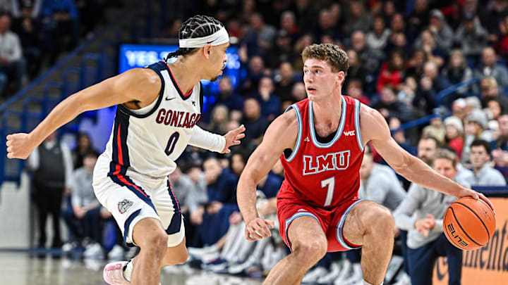 Gonzaga guard Ryan Nembhard defends against LMU guard Jan Vide.