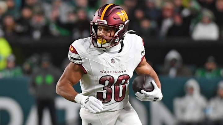 Nov 14, 2024; Philadelphia, Pennsylvania, USA; Washington Commanders running back Austin Ekeler (30) against the Philadelphia Eagles at Lincoln Financial Field. Mandatory Credit: Eric Hartline-Imagn Images