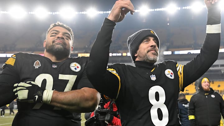 Jan 4, 2026; Pittsburgh, Pennsylvania, USA; Pittsburgh Steelers quarterback Aaron Rodgers (8) and defensive tackle Cameron Heyward (97) celebrate after defeating the Baltimore Ravens at Acrisure Stadium. Mandatory Credit: Barry Reeger-Imagn Images
