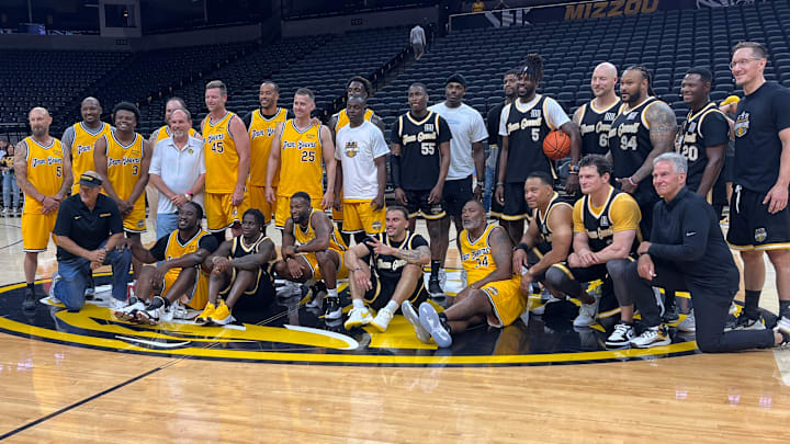 June 14, 2025; Columbia, Missouri, USA; Missouri Tigers football and men's basketball alumni pose for a picture after a charity basketball game at Mizzou Arena.