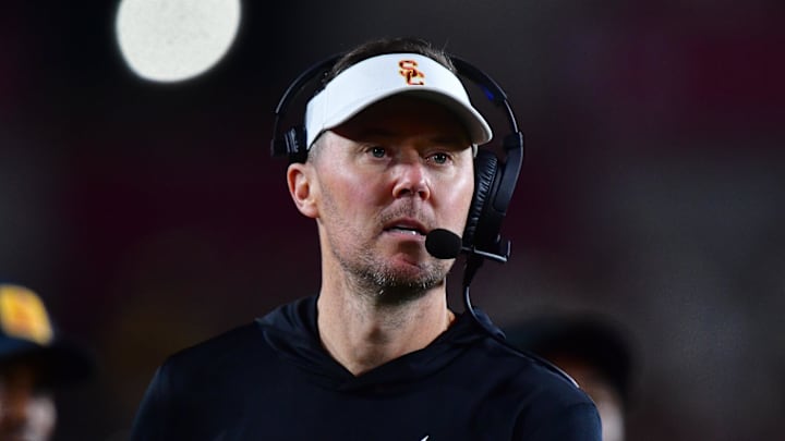 Nov 7, 2025; Los Angeles, California, USA; Southern California Trojans head coach Lincoln Riley watches game action against the Northwestern Wildcats during the second half at the Los Angeles Memorial Coliseum. Mandatory Credit: Gary A. Vasquez-Imagn Images