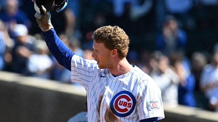 Sep 24, 2026; Chicago, Illinois, USA;  Chicago Cubs center fielder Pete Crow-Armstrong (4) acknowledges the crowd after stealing second base during the first inning against the Miami Marlins at Wrigley Field. It was his 40th stolen base.  Mandatory Credit: Matt Marton-Imagn Images