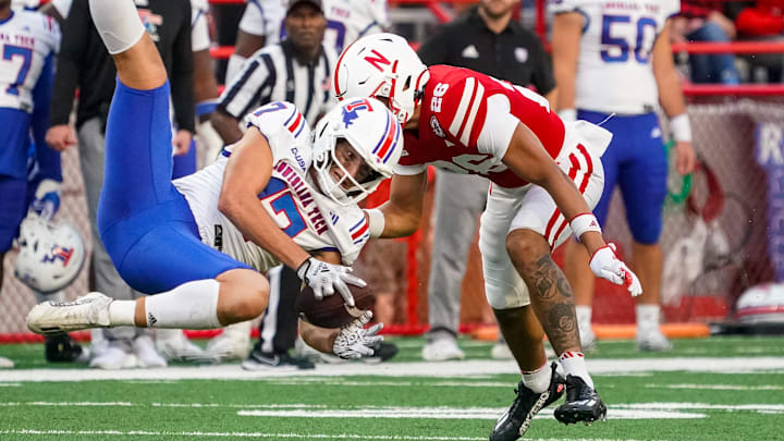 Sep 23, 2023; Lincoln, Nebraska, USA; Louisiana Tech Bulldogs tight end Nate Jones (17) catches a pass against Nebraska Cornhuskers defensive back Koby Bretz (26) during the fourth quarter at Memorial Stadium.