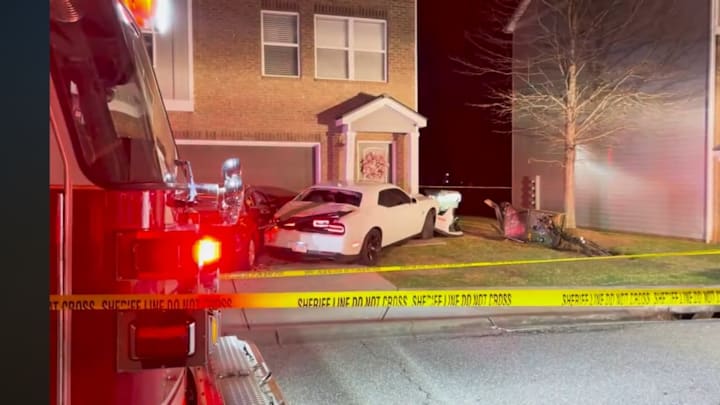 The scene after a Georgia football player is reported to have crashed his car into the front of an apartment house. The scene after a Georgia football player is reported to have crashed his car into the front of an apartment house.