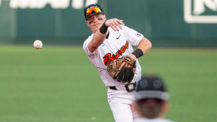 Oregon State's Travis Bazzana throws to first base against Tulane in the Corvallis Regional of the NCAA Tournament Friday, May 31, 2024, at Goss Stadium in Corvallis, Ore.