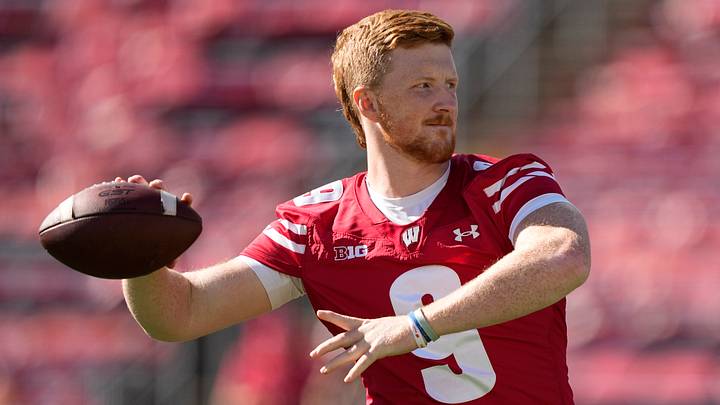Oct 18, 2025; Madison, Wisconsin, USA; Wisconsin Badgers quarterback Billy Edwards Jr. (9) warms up before the game against the Ohio State Buckeyes at Camp Randall Stadium. Mandatory Credit: Jeff Hanisch-Imagn Images