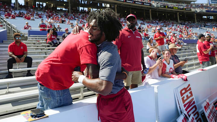Oklahoma QB Michael Hawkins Jr. (9), a former Frisco Emerson High School (Texas) standout, arrives before the Red River Rivalry on Satureday at the Cotton Bowl in Dallas.