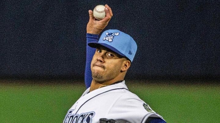 Wilmington Blue Rocks pitcher Andry Lara (22) winds up for a pitch against the Brooklyn Cyclones during the 2024 South Atlantic League baseball season opener at Frawley Stadium in Wilmington Friday, April 5, 2024. Blue Rocks won 4-1