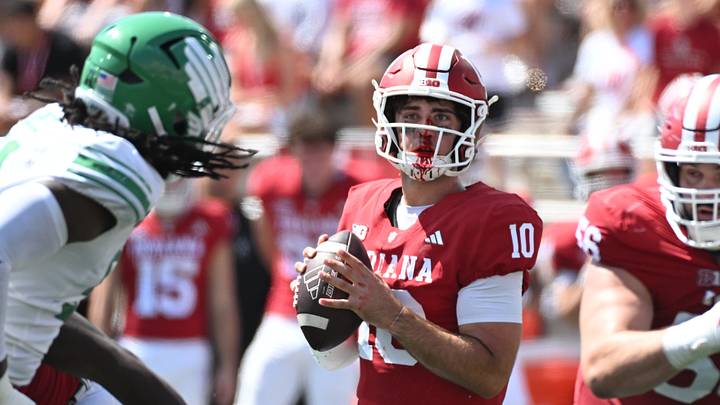 Indiana quarterback Josh Hoover stands in the pocket with blood on his face against North Texas on Saturday. Indiana quarterback Josh Hoover stands in the pocket with blood on his face against North Texas on Saturday.