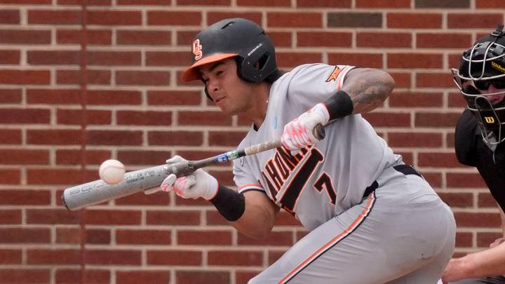 Oklahoma State batter Avery Ortiz pops up a bunt attempt.