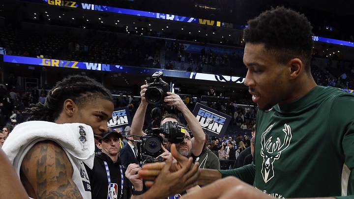 Dec 15, 2022; Memphis, Tennessee, USA; Memphis Grizzlies guard Ja Morant (left) and Milwaukee Bucks forward Giannis Antetokounmpo (34) shake hands after the game at FedExForum. Mandatory Credit: Petre Thomas-Imagn Images Dec 15, 2022; Memphis, Tennessee, USA; Memphis Grizzlies guard Ja Morant (left) and Milwaukee Bucks forward Giannis Antetokounmpo (34) shake hands after the game at FedExForum. Mandatory Credit: Petre Thomas-Imagn Images