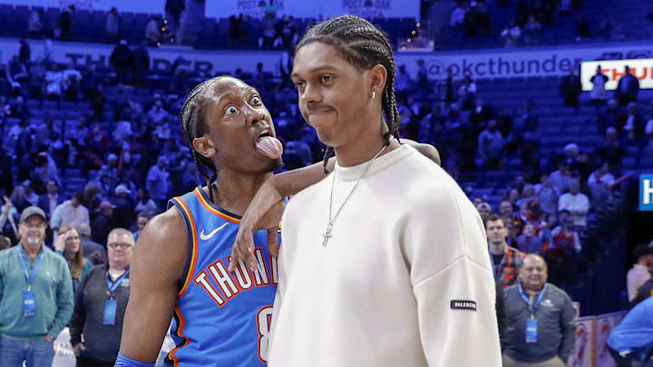 Jan 22, 2025; Oklahoma City, Oklahoma, USA; Oklahoma City Thunder forward Jalen Williams (8) reacts towards his brother Utah Jazz forward Cody Williams (5) after their game at Paycom Center. Mandatory Credit: Alonzo Adams-Imagn Images