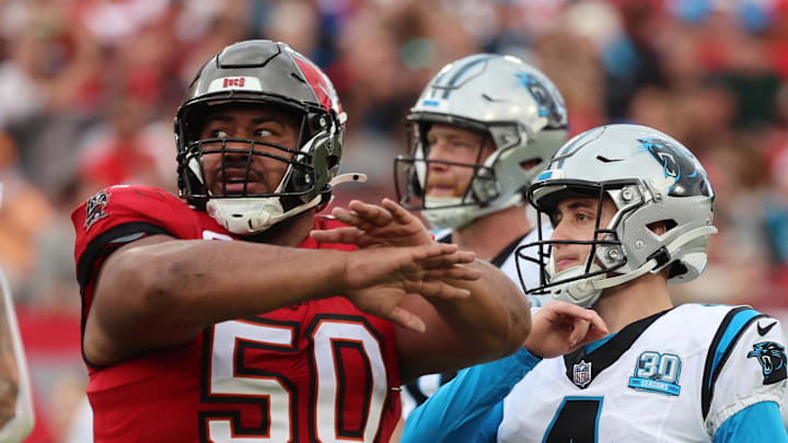 Tampa Bay Buccaneers defensive tackle Vita Vea (50) reacts after Carolina Panthers place kicker Eddy Pineiro (4) misses an extra point.
