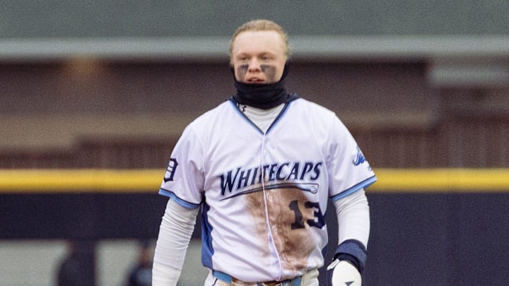 Whitecaps center fielder Max Clark walks toward the dugout on Friday, April, 4, at LMCU Ballpark. Whitecaps center fielder Max Clark walks toward the dugout on Friday, April, 4, at LMCU Ballpark.