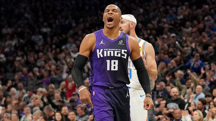 Nov 7, 2025; Sacramento, California, USA; Sacramento Kings guard Russell Westbrook (18) reacts after the Kings made a basket against the Oklahoma City Thunder in the second quarter at the Golden 1 Center. Mandatory Credit: Cary Edmondson-Imagn Images
