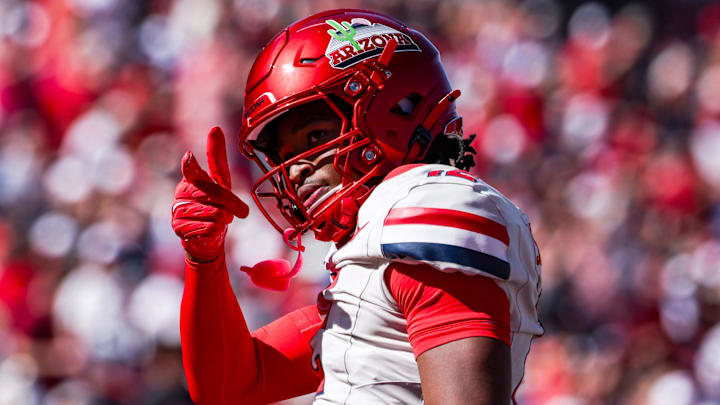 Oct 4, 2025; Tucson, Arizona, USA; Arizona Wildcats wide receiver Tre Spivey (12) celebrates after a play during the third quarter of the game against the Oklahoma State Cowboys at Arizona Stadium. Mandatory Credit: Aryanna Frank-Imagn Images