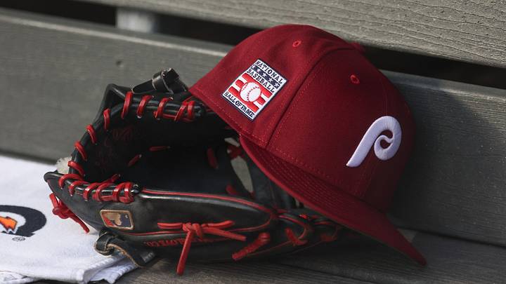 Jul 25, 2025; Bronx, New York, USA; A detailed view of a Hall of Fame patch on a Philadelphia Phillies hat resting in the dugout during the second inning against the New York Yankees at Yankee Stadium. Jul 25, 2025; Bronx, New York, USA; A detailed view of a Hall of Fame patch on a Philadelphia Phillies hat resting in the dugout during the second inning against the New York Yankees at Yankee Stadium.