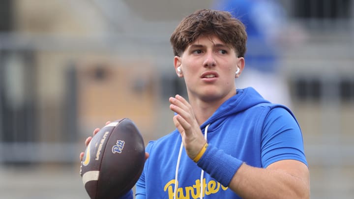 Aug 30, 2025; Pittsburgh, Pennsylvania, USA;  Pittsburgh Panthers quarterback Mason Heintschel (6) warms up before the game against the Duquesne Dukes at Acrisure Stadium. Mandatory Credit: Charles LeClaire-Imagn Images