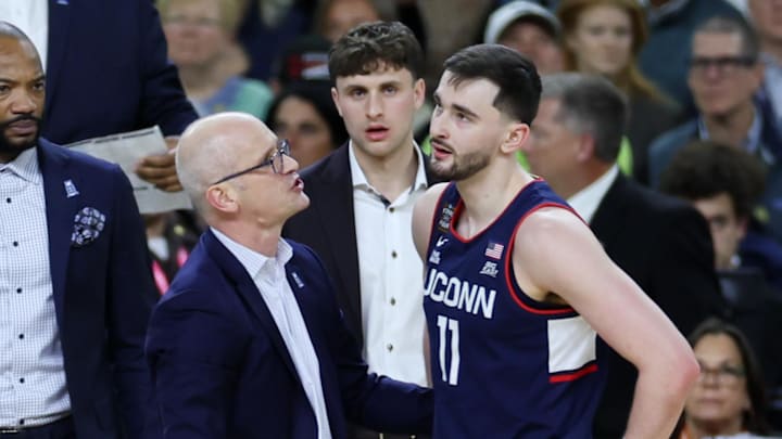 Apr 6, 2026; Indianapolis, IN, USA; UConn Huskies head coach Dan Hurley talks to UConn Huskies forward Alex Karaban (11) against the Michigan Wolverines in the second half during the national championship of the Final Four of the men's 2026 NCAA Tournament at Lucas Oil Stadium. Mandatory Credit: Trevor Ruszkowski-Imagn Images Apr 6, 2026; Indianapolis, IN, USA; UConn Huskies head coach Dan Hurley talks to UConn Huskies forward Alex Karaban (11) against the Michigan Wolverines in the second half during the national championship of the Final Four of the men's 2026 NCAA Tournament at Lucas Oil Stadium. Mandatory Credit: Trevor Ruszkowski-Imagn Images