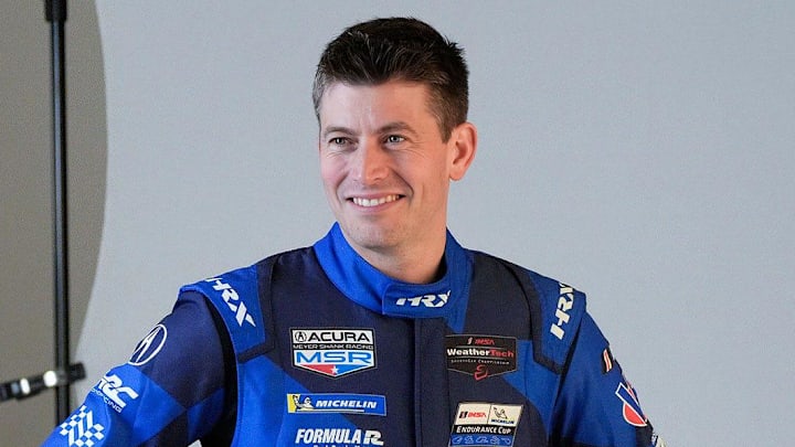 Colin Braun with Acura Meyer Shank Racing poses for photographs during IMSA Media Day, Thursday, Jan. 15, 2026, in the Daytona 500 club at Daytona International Speedway.