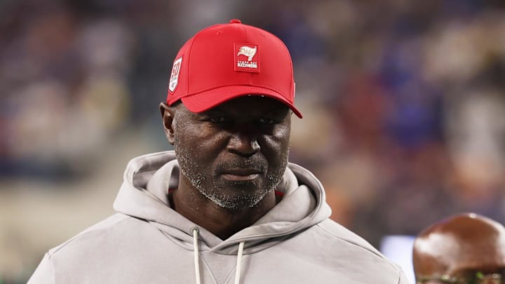 Tampa Bay Buccaneers head coach and defensive coordinator Todd Bowles walks off the field during halftime against the Los Angeles Rams