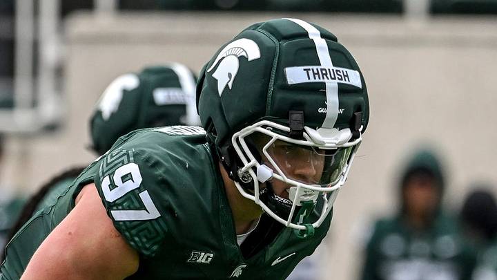 Michigan State's Cal Thrush, center, lines up before a play during the football Spring Showcase on Saturday, April 18, 2026, at Spartan Stadium in East Lansing. Michigan State's Cal Thrush, center, lines up before a play during the football Spring Showcase on Saturday, April 18, 2026, at Spartan Stadium in East Lansing.