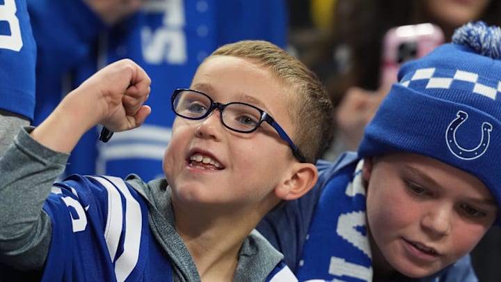 A young Indianapolis Colts fan celebrates