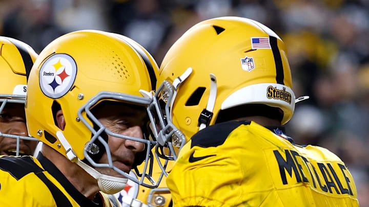 Aaron Rodgers and DK Metcalf of the Pittsburgh Steelers Aaron Rodgers and DK Metcalf of the Pittsburgh Steelers