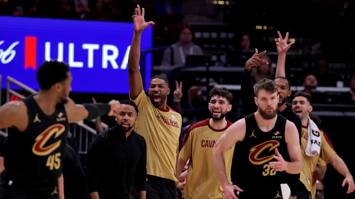 Jan 22, 2025; Houston, Texas, USA; Cleveland Cavaliers bench players react after a made basket by Cleveland Cavaliers forward Dean Wade (32) against the Houston Rockets during the fourth quarter at Toyota Center. Mandatory Credit: Erik Williams-Imagn Images