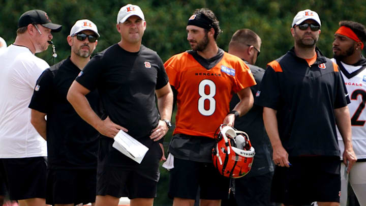 Cincinnati Bengals head coach Zac Taylor  observes practice alongside Cincinnati Bengals quarterback Brandon Allen (8) and offensive coordinator Brian Callahan, far, right, during Cincinnati Bengals training camp practice, Friday, July 29, 2022, at the practice fields next to Paul Brown Stadium in Cincinnati.

Cincinnati Bengals Training Camp July 29 0020